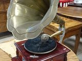 a wooden table with a record player on top of it