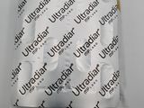 a packet of water sitting on top of a piece of paper