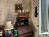 an image of a bedroom with a bed and a desk