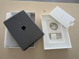 a box with an apple ipad in it on a table