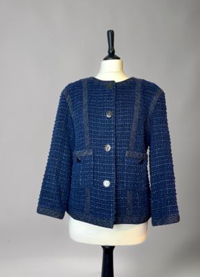 a close up of a blue jacket on a mannequin mannequin