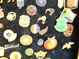 a picture of a display case with a lot of pins