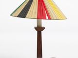 an image of a lamp with a multicolored shade on it