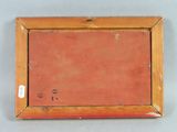 an old wooden picture frame with a painting on it