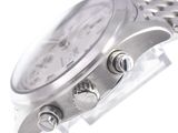an image of a close up of a watch on a white surface