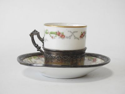 an image of a coffee cup and saucer on a saucer