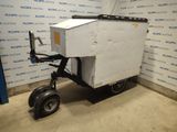 une image représentant une remorque à laquelle est fixée une caisse