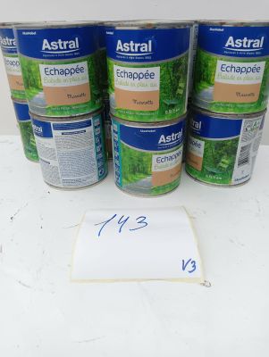 four cans of astrall echappee on a table with a note