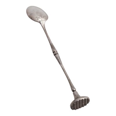 a silver spoon with a handle on a white background