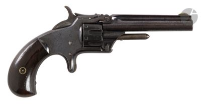 a close up of a revolver on a white background