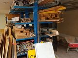 a room filled with lots of wood and other items