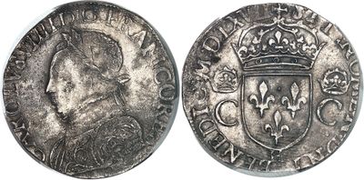 a close up of a coin with a crown on top of it