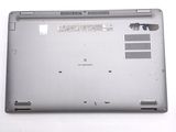 a laptop that is sitting on a white surface