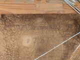 a close up of a wooden box with wires on it