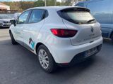 a white car that is parked in a parking lot