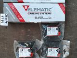 three boxes of elematic cable systems sitting on a table