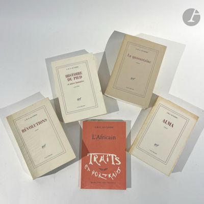 several books are sitting on a white surface with a white background