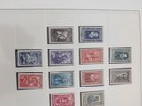 a picture of a picture of a collection of stamps on a wall