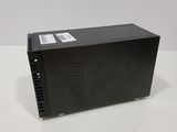 a close up of a black power supply unit on a white surface