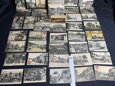 a lot of old black and white pictures on the table