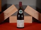 a bottle of wine that is sitting on a table