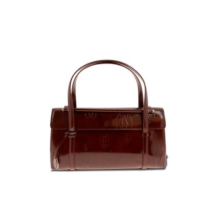 une image représentant un sac à main marron sur fond blanc