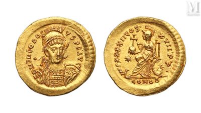 a gold coin with an image of a man on it