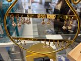 a display case that has a bunch of jewelry on it