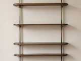 an image of a wall mounted shelf with three shelves on each side