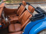 an image of a blue and brown car with leather seats