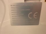 a picture of a close up of a card on a toilet