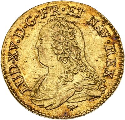 une pièce d'or représentant le profil d'un homme