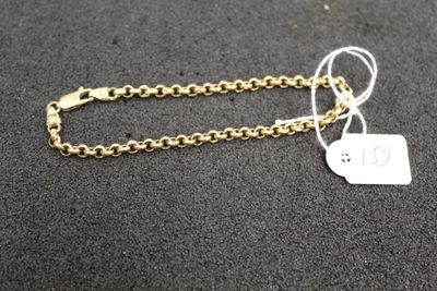a close up of a chain with a tag attached to it