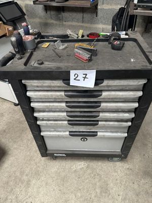 an image of a workbench with a lot of tools on it