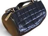 navy blue quilted leather handbag with gold hardware