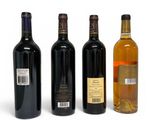 three bottles of wine sit next to each other on a white surface