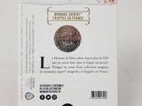 a close up of a harry potter coin on a stand