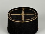 an image of a black box with a gold cross on it
