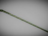 an old green cane with a long handle on a gray background