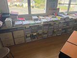 a lot of books that are sitting on a table