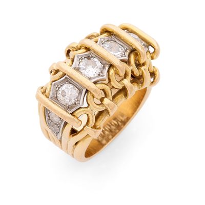 une bague en or jaune 18k et diamants
