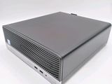 an image of a small computer on a white surface