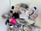 a pile of socks and other items on the floor