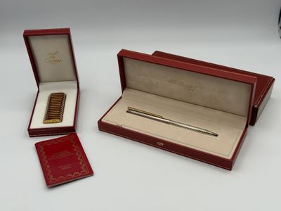 a red box with a gold pen and a red box with a gold pen and a red box with a gold pen and a red box with a gold