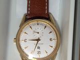 a watch that is sitting in a box on the table