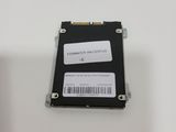 a close up of a hard drive on a white surface