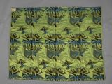 une image représentant un motif floral vert et bleu sur fond gris