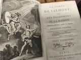 an old book with a picture of a man on it