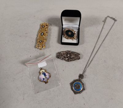 a lot of jewelry that is sitting on a table