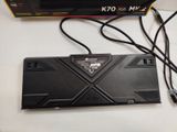 a black keyboard and a black mouse on a table